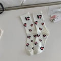 White mid-calf crew socks with pink and black leopard pattern on cream desk - One Size / White - Pink Black Leopard