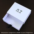 White drawer-style jewelry box with black ribbon handle, dimensions 9cm x 12.2cm x 4cm - Drawer Box-White