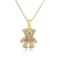 Detalle del collar con colgante de oso dorado con circonitas rosas y blancas incrustadas - Oso de Peluche con Corazón Rosa / Dorado/Rosa