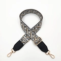 Ethnic geometric woven shoulder strap with black leather ends and gold metal buckles - Cross Jacquard
