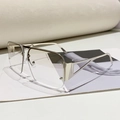 Modern oversized silver metal pilot glasses with geometric hollow temples on a magazine - Silver Frame Gradient White Lens