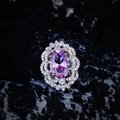 Macro detail of oval purple gemstone ring with wavy pavé diamond border on silver band - Pink Rhinestone Ring (Open Adjustable)