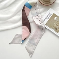 Artistic color-block twilly scarf with elegant script for hair or handbag styling - Sunset