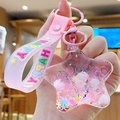 Pink star-shaped liquid glitter keychain with floating beads and pink silicone wristband - Fresh Star - Pink