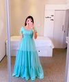 Detail of smocked bodice and tiered skirt on a light blue floral off-shoulder maxi dress - S / Lake Blue