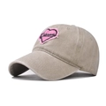 Detail of pink heart embroidery with Colorado text on vintage khaki washed cotton cap - Khaki with Pink Heart