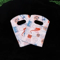 Mini plastic gift bags with colorful musical instrument prints and die-cut handles - No. 66 (Music Theme)