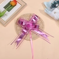 Large matte purple metallic tulle pull bow for Christmas gift wrapping and wedding decor - Pink