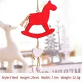 Christmas hanging decoration featuring a red wooden rocking horse with heart beads - Red Rocking Horse Ornament