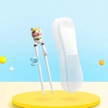 Kids training chopsticks set with white cartoon cow top and storage case - Cow Training Chopsticks With Box
