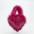 Detail of rose red heart-shaped faux fur bag with black tips and fluffy texture - Small / Rose Red