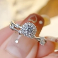 Silver halo engagement ring with twisted pavé band and a brilliant round center stone - Sparkling Like Stars [1 Carat] Ljz-94 / Adjustable Open