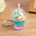 Cute green and purple gradient ice cream keychain with star and bear toppings - Blue