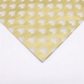 Floral wrapping paper featuring white heart patterns on a premium golden glossy finish - White Hearts On Gold
