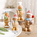 Set of four resin gingerbread man Christmas figurines with sizes and weights specifications - Set of 4 (2 Large + 2 Small)
