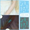 Luminous temporary tattoos JSN-048 featuring floral and butterfly designs in glowing blue - JSN-048 (Luminous Multi Mandala)