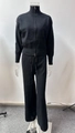 Détail d'un ensemble en tricot noir avec veste à col zippé et pantalon à cordon réglable - S / Noir