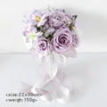 Ramo de novia con rosas moradas, lirios artificiales y largas cintas de seda - Púrpura Taro