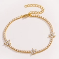 Adjustable golden tennis bracelet with three micro-pave cubic zirconia flower motifs - White