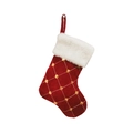 Détail de chaussette de Noël en velours rouge avec paillettes dorées et fausse fourrure - Rouge