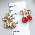 DIY cherry charm pendant in gold alloy with red rhinestones and bow detail for jewelry - Bow Red Rhinestone Cherry (23423)