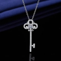 Silver finish key pendant necklace with micro-p镶 pave stones on blue silk background - Xl-153 [with Cross Chain]