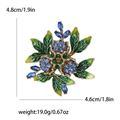 Elegante broche de rosa con cristales azules y hojas verdes en aleación dorada - Azul