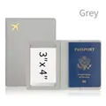 Grey PU leather passport holder with golden airplane icon and 3x4 inch clear card slot - Gray
