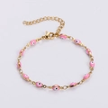 Classic gold link bracelet featuring pink evil eye charms with adjustable lobster clasp - Pink Eye