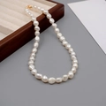 Elegant baroque freshwater pearl necklace with gold clasp on premium jewelry tray - 7-8mm Baroque Pearl Necklace