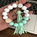 Llavero de pulsera de silicona con borla verde menta y cuentas de patrón de mármol - Verde Menta