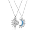 Detailed view of silver sun and moon necklaces with pavé-set blue and white cubic zirconia - Silver Pair / Silver Sun & Moon Pair