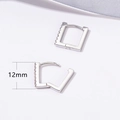 Detail showing 12mm square silver earrings with side-set crystal stones in a pair - 12mm / Silver