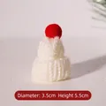Detailed view of mini white knitted Christmas hat measuring 3.5cm wide and 5.5cm high - Diameter 3.5cm Height 5.5cm / White Hat Red Pom