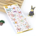 Dreamy unicorn stickers with gold foil details on a transparent adhesive backing sheet - Starry Unicorn