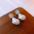 Silver square zircon earrings with baroque pearl drops on a warm background - Silver White Zircon Earrings