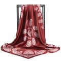 Detail of dark red paisley satin square scarf elegantly draped on a black metal stand - 90*90cm / Burgundy