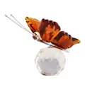 Handcrafted crystal butterfly figurine with amber wings on a clear faceted sphere base - Brown/Amber