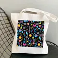 White canvas tote bag featuring science illustrations like DNA and microscope - C18 Science Emblem No Inner Pocket No Zipper