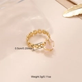 Detail view of pink natural stone ring with 0.5cm chain band weighing 3g in gold - Gold Band + Pink Stone / Pink
