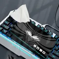 Individually wrapped black cleaning wipes placed on a backlit mechanical keyboard - Cafe Black Cleaning Style / Black