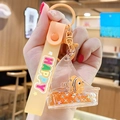 Cute clownfish liquid quicksand keychain with orange strap and boat charm - Ocean Creature - Little Goldfish
