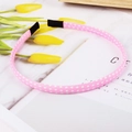 Pink polka dot fabric headband with black trimmed ends on white marble background - Pink Polka Dots
