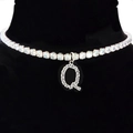 Silver choker necklace featuring a sparkling zircon-studded letter Q pendant on black mannequin - Letter Q [Silver]