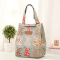 Blue rabbit printed lunch bag with leather label and insulated aluminum foil interior - D Style Bear
