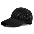 Women's black hollow knit baseball cap featuring breathable geometric woven patterns - Adjustable / Black