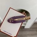 Purple hair clip with golden moon and star motifs featuring yellow rhinestones - Purple Moon