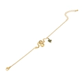 Golden snake and green clover charm necklace with sparkling stones on white background - Bracelet