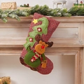 Red and green knitted Christmas stockings with reindeer patterns on festive fireplace - Knit Reindeer Carrying Gift Stocking