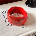 Minimalist wide geometric acrylic bangle in red resin with black marbled pattern - Red